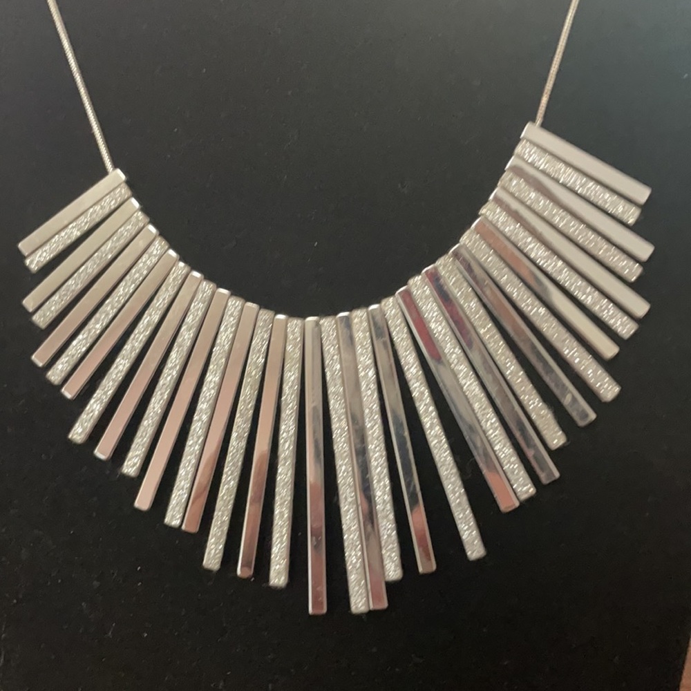 Charming Charlie Silver tone statement necklace.